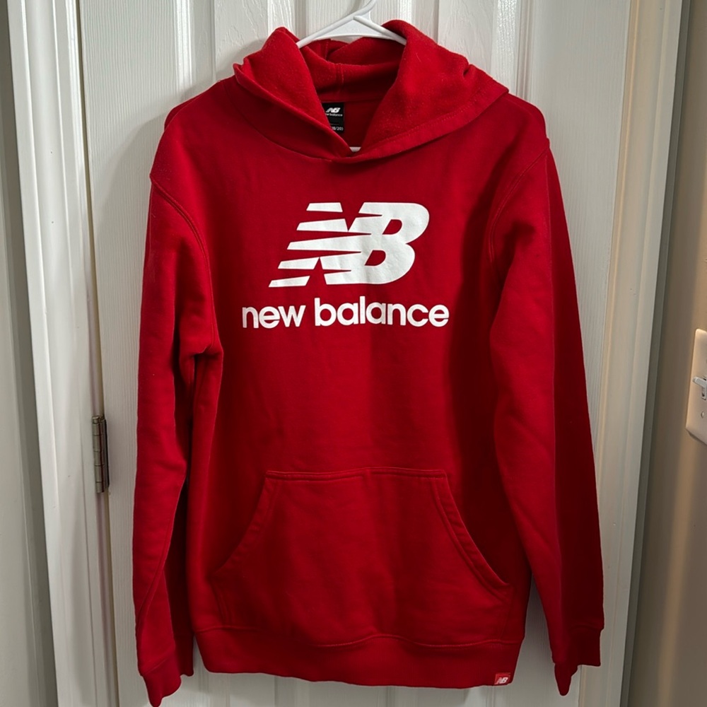 Brand new without tags New Balance youth sweatshirt size 18/20.